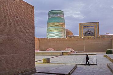 Kalta Minor minaret, street scene in Ichon-Qala, old city, Khiva, Uzbekistan