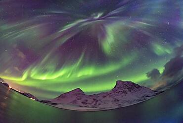 A sky-covering aurora on March 14, 2018, as seen from the Hurtigruten ship the m/s Nordnorge, as we sailed south toward Tromsø, Norway.