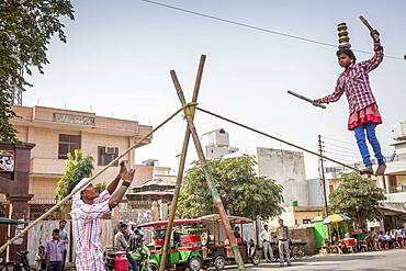 Show, street artist and spontaneous photographer, Street scene, in Historical Center,Vrindavan, Mathura, Uttar Pradesh, India