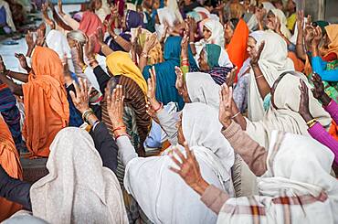 Widows praying in an Balaji ashram, Vrindavan, Mathura district, India