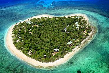 Aerial view of the heart-shaped island of Tavarua, near Viti Levu, Republic of Fiji, South Pacific Islands, Pacific