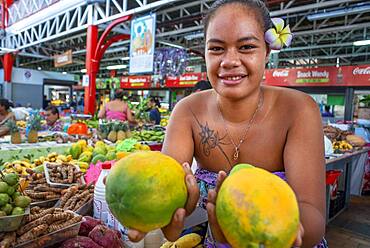 Woman fruit seller at Papeete Municipal covered Market, Papeete, Tahiti, French Polynesia, Tahiti Nui, Society Islands, French Polynesia, South Pacific.