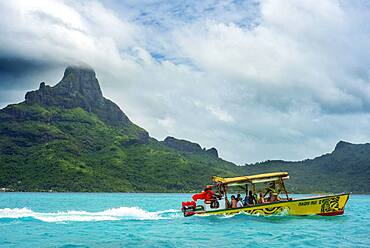 An outrigger boat used for reef excursions in Bora Bora, French Polynesia Society Island.