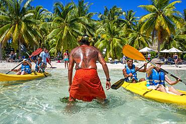 Kayaking in Taha'a island beach, French Polynesia. Motu Mahana palm trees at the beach, Taha'a, Society Islands, French Polynesia, South Pacific.