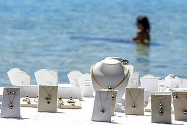 Island of Taha'a, French Polynesia. Local vendor of pearls at the Motu Mahana, Taha'a, Society Islands, French Polynesia, South Pacific.