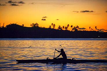 Rowing at sunset in Tahiti, French Polynesia, Tahiti Nui, Society Islands, French Polynesia, South Pacific.