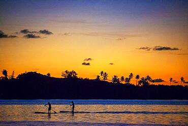 Rowing at sunset in Tahiti, French Polynesia, Tahiti Nui, Society Islands, French Polynesia, South Pacific.