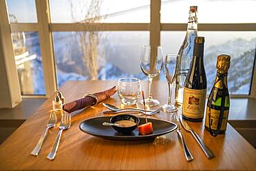 Traditional dinner on the sunset in The Observatory Of Pic Du Midi De Bigorre, Hautes Pyrenees, Midi Pyrenees, France