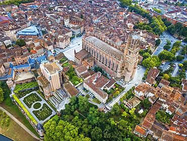 Gothic Saint Cecile Cathedral in Albi town. Pont Vieux bridge and the Church of Notre Dame du Breuil in Tarn village, Languedoc-Roussillon Occitanie Midi Pyrenees France.