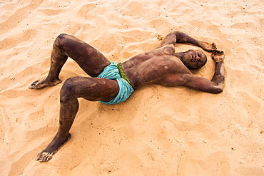 Wrestlers play Senegalese wrestling in Simal