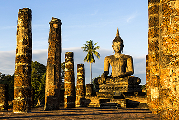 Archaeological site, ruins and Buddha statue in Sukhotai