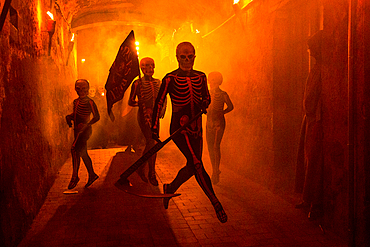 Verges, a small town in the Northeast of Catalonia (Spain), during Easter celebrates the Procession of Verges with skeletons dancing on the sound of a drum, Roman soldiers, known as the 'Manages', and a representation of the life and crucifixion of Jesus Christ. The Procession features the Dance of Death, a tradition from the Middle Age associated with epidemics and plagues and the only one remaining in Spain Ten skeletons dance to the beat of a drum to remember that no one is exempt of death. The backdrop of the medieval walls and towers of Verges is key to this macabre staging.