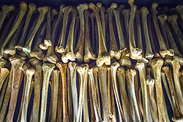 The remains of known victims of the 1994 Rwandan Genocide remain interred and on display inside of of the Kigali Genocide Memorial as a testament to those lost in the brutality, Kigali, Rwanda.