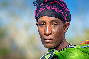 A portrait of an Ethiopian woman in colorful clothing, Debre Berhan, Ethiopia