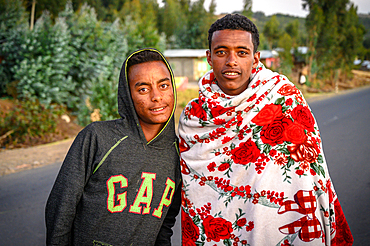 A pair of young Ethiopian men pose for a photograph, Debre Berhan, Ethiopia