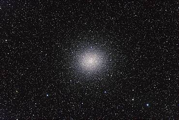 Omega Centauri globular cluster, with Canon 20Da camera with 4-inch Astro-Physics Traveler apo refractor at f/6 for 4 minutes each at ISO800. Stack of 4 exposures, averaged stacked. Plus short 2-minute exposure for core area. Taken from Queensland, Australia, July 2006.