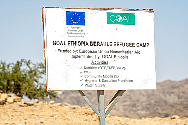 A sign for the Goal Ethiopia Berahle Refugee Camp in Danakil Depression, Ethiopia