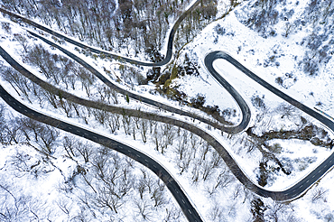 Snow-covered road. Olazagutia pass. Urbasa mountain range. Navarre, Spain, Europe