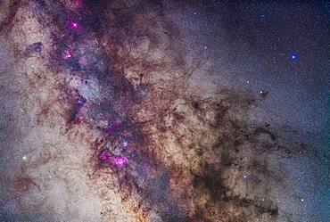 A mosaic of the region around the Small Sagittarius Starcloud and Dark Horse dark nebula complex. The field takes in the Milky Way from the Lagoon Nebula at bottom to the Eagle Nebula at top left. In between from top to bottom are the Swan Nebula (M17), and the Small Sagittarius Starcloud (M24). Flanking the bright M24 starcloud are the large open clusters M23 (right) and M25 (left). At bottom left is the M22 globular star cluster. The prominent dark nebula at right is the large Pipe Nebula (B78) with the small Snake Nebula (B72) above it. The whole complex is visible to the naked eye as the Dark Horse.