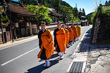 Group of female monks walking in the streets of Koyasan or Mount Koya, a huge temple settlement in Wakayama Prefecture