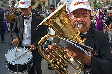 Holy Week processions in Guatemala city. Holy Thursday. Comparsa. Holy Week in Guatemala is celebrated with street expressions of faith, called processions, usually organized by a "hermandades". Each procession of Holy Week has processional floats and steps, which are often religious images of the Passion of Christ, or Marian images, although there are exceptions, like the allegorical steps of saints.