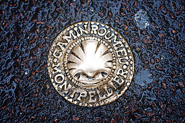 Water sewer in Montpellier France

A symbol on the ground warns us that the Camino de Santiago Way of St. James also passes through Montpellier. The Via Tolosana is the Latin name for one of the four routes in France on the Camino de Santiago, the southernmost. It passes through Toulouse (in Spanish and Occitan, Tolosa, hence its name), but its meeting point and starting point is Arles.