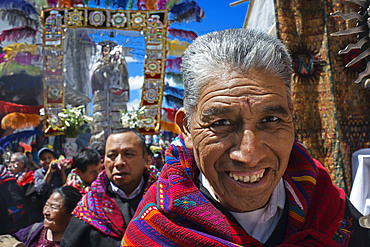 Chichicastenango, Quiche, Guatemala, Central America. Processions of Festival of Santo Thomas. On Easter Sunday The Comrades (Council Men) Carry The Andas (Floats) Of The Saints In Procession From The Santo Tomas