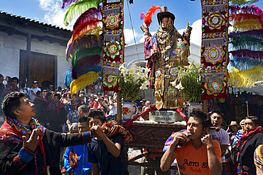 Chichicastenango, Quiche, Guatemala, Central America. Processions of Festival of Santo Thomas. On Easter Sunday The Comrades (Council Men) Carry The Andas (Floats) Of The Saints In Procession From The Santo Tomas