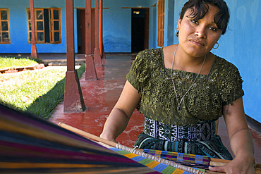 A mayan woman tz'utujile working in the textil in San Juan de la Laguna, Solol√°, Guatelama.