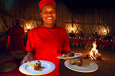 Night dinner wiht fire at Mala Mala Game Reserve Sabi Sand Park Kruger South Africa, Africa