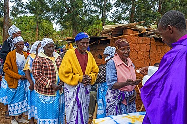 Funeral for the death of a person due to Coronavirus and AIDS in a small village near Kitui city in the Kamba country in Kenya, Africa.