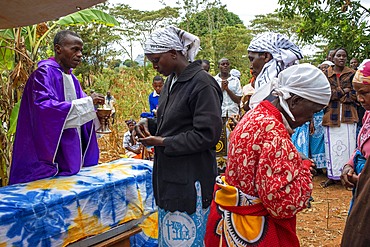 Funeral for the death of a person due to Coronavirus and AIDS in a small village near Kitui city in the Kamba country in Kenya, Africa.