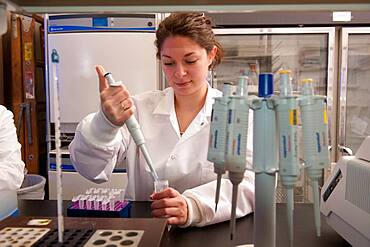 Scientist conducting an experiment in a laboratory