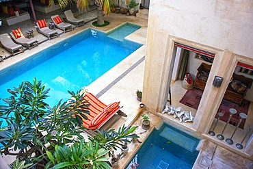 The Pool And Long Chairs In Lamu Patio House Hotel, Lamu, Kenya