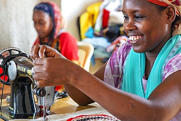 Sewing cloths to make souvenirs. Afrikable spanish NGO in Lamu island Kenya. This association tries to empower women who have been victims of abuse. By making souvenirs that are later sold in the village store and the schooling of their children.