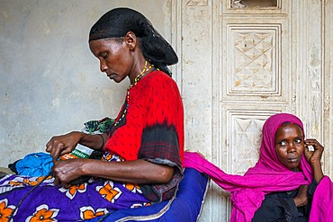 Sewing cloths to make souvenirs. Afrikable spanish NGO in Lamu island Kenya. This association tries to empower women who have been victims of abuse. By making souvenirs that are later sold in the village store and the schooling of their children.