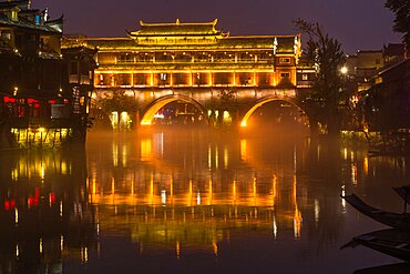 The Phoenix Hong or Hongqiao Bridge was built in the MIao style over the Tuojing River, Fenghuang, China.