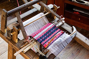 A wooden loom for making hand-woven fabric of the Red Yao ethnic minority in Jinkeng, China.