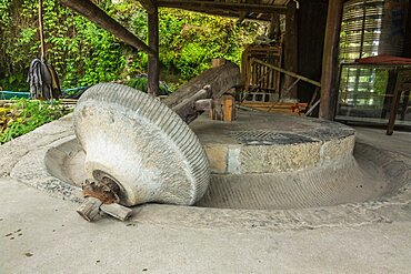 An old stone grist mill in the ancient town of Furong, China.