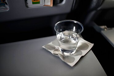 Glass of water on plane table