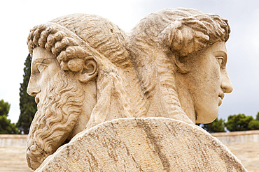 Stone heads of two sided herms inside Panathenaic Stadium, original modern day Olympic Stadium, Athens, Greece