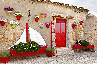 Exterior wall of a restaurant, Marzamemi, Sicily, Italy