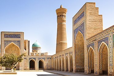 Kalon Mosque courtyard, also known as Kalyan Mosque, Kalon Minaret and Mir I Arab Madrasah behind, Bukhara, Uzbekistan