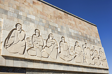 Carved stone figures on front of Afrosiab Museum, also known as Afrosiyob Museum, Samarkand, Uzbekistan