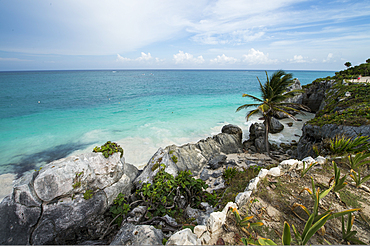 Tulum is the site of a Pre-Columbian Maya walled city serving as a major port for Cobá, Daily tour buses bring a constant stream of visitors to the site,