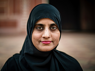 A woman visiting the mosque in the Taj Mahal