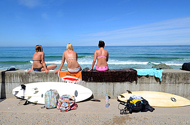 People on Cote des Basques beach at sunset, Biarritz