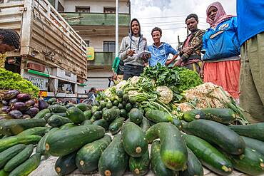 Addis Ababa, Ethiopia- Locals buying and selling vegetables at Addis Mercato, the largest open air market in Africa.