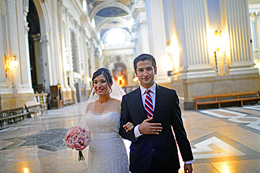 Latin bride enters church with her brother