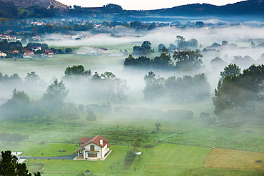 Fog at dawn. Liendo Valley. Cantabria, Spain, Europe.